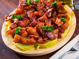 Spanish dish - roasted pig nose and cheeks