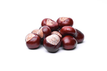 Group of ripe chestnuts isolated on white background
