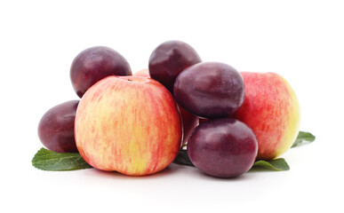 Group of fresh apples and plums.