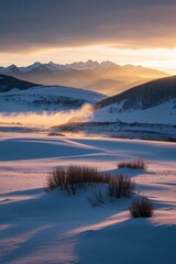 Fototapeta premium snowy landscape with a river and mountains in the distance