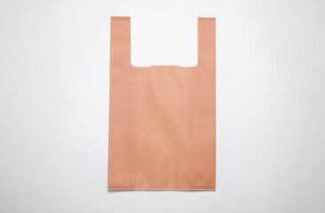 Eco fabric disposable supermarket bag on white background