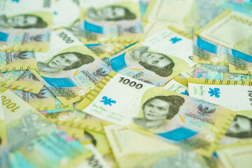 A stack of thousand rupiah banknotes, Indonesian money. suitable for background, finance, banking, cash, savings.