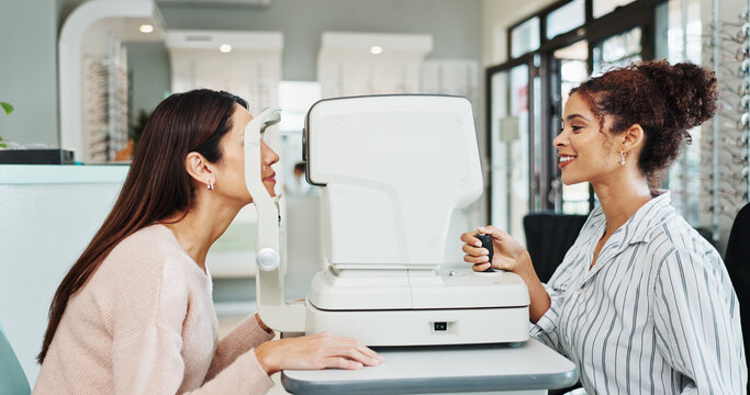 Healthcare, eye test or equipment with optometrist and patient in clinic for visual assessment. Autorefractor, exam and medical with people in optometry store for prescription frame lenses or vision