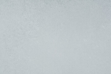 Light grey textured background with grainy surface minimalistic style
