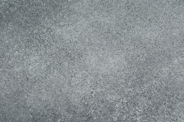 Fototapeta premium Gray speckled textured background abstract concrete surface