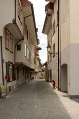 Obraz premium Narrow city street with old houses in Aarau, Switzerland. No people.