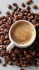 Obraz premium Coffee cup surrounded by coffee beans