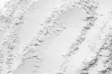 The texture of dry cosmetic clay for a skin mask.