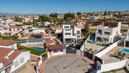 Modern villas with private pools in a residential cul-de-sac