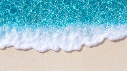 Turquoise waves kissing the beach sand