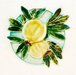 Detail of the traditional tiles from facade of old house. Decorative tiles.Valencian traditional tiles. Floral ornament. 