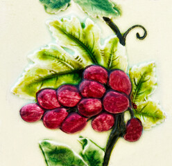 Detail of the traditional tiles from facade of old house. Decorative tiles.Valencian traditional tiles. Floral ornament. 