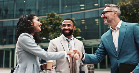 Happy, business people or handshake in city for greeting, meeting or partnership in urban town....