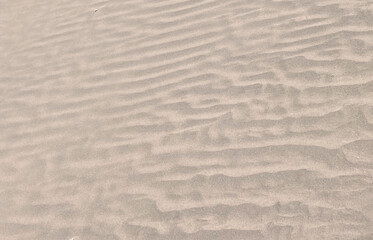 Desert volcanic sand pattern texture background in Montana Pelada beach, Tenerife,Canary Islands,Spain.
