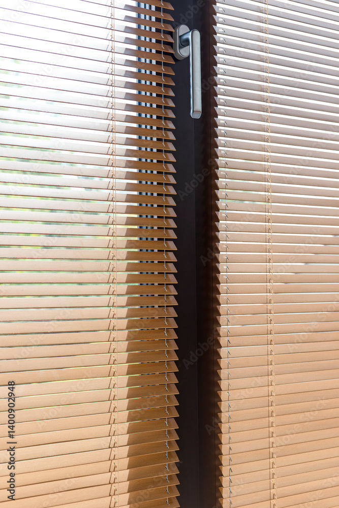Poster a bright view of partially opened beige horizontal window blinds with natural daylight streaming thr