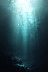 Fototapeta premium underwater seascape with sunlight beams, deep ocean view showing aquatic light rays and marine depth, calm dark water scene with peaceful glow and blue silence 