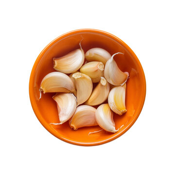 Top view of fresh garlic slices bowl on transparent background