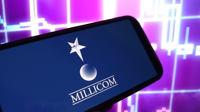 Konskie, Poland - April 06, 2025: Millicom company logo displayed on mobile phone