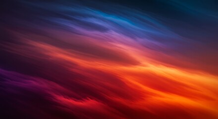 Naklejka premium Colorful sky abstract with smooth, blended hues of blue, purple, and red; atmospheric and dynamic color gradient