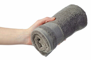 Gray roll towel in hand on white background isolation