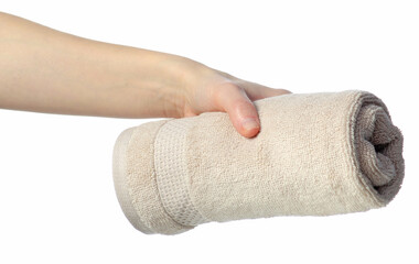 Beige stack roll towel in hand on white background isolation
