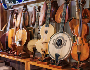 Fototapeta premium Traditional Cypriot music instruments like the lute or flute are displayed, representing the island's rich musical heritage and cultural expressions.