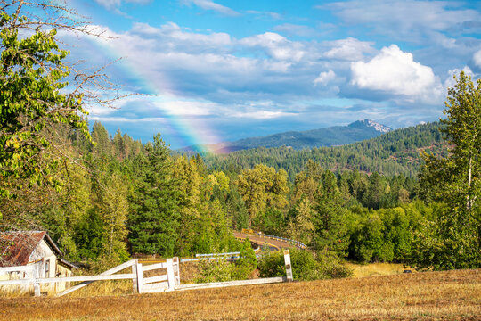 A rainbow above a rural farm near Cataldo, Idaho, in the mountains of the Silver Valley region in the North Idaho panhandle.