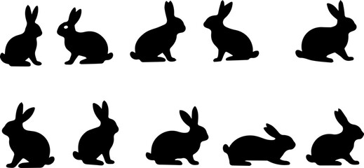 Silhouettes of easter bunnies isolated on a white background