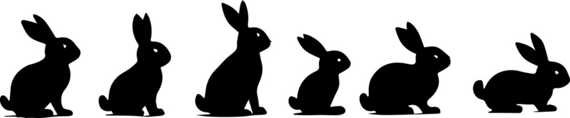 Silhouettes of easter bunnies isolated on a white background