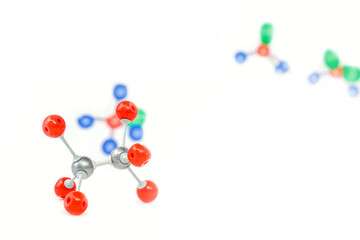 Simulate Shape of covalent molecules on white background. Soft and selective focus.