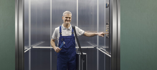 Professional plumber in the elevator © stokkete