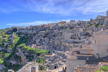 Naklejka premium Townscape of the Sassi of Matera, Italy: view of the Murgia Materana Nature Reserve and Cave Churches. 
