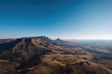 Fototapeta premium drone-shot aerial view captures south african landscape from top-down perspective