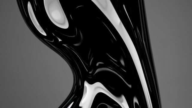 Abstract flowing black liquid with metallic texture, surreal fluid art motion