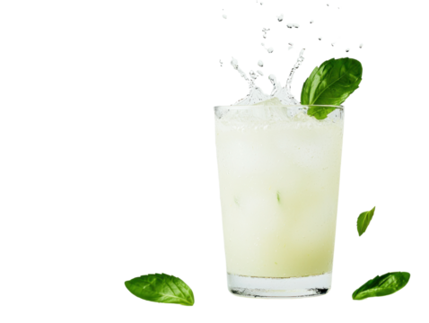 Refreshing drink splashing in glass cutout background indoor setting vibrant green elements