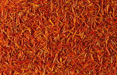 Fototapeta premium Safflower dry petals background and texture