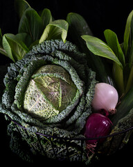 Assorted Green Vegetables in Mesh Basket with Dark Mood