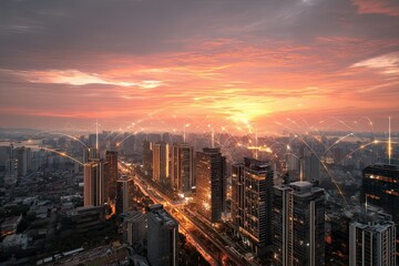 Fototapeta premium Futuristic cityscape illuminated by a vibrant sunset with network connections