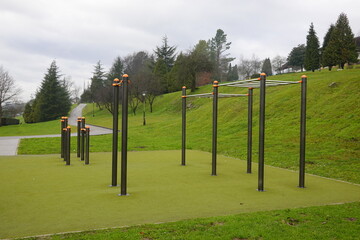 Fototapeta premium Outdoor calisthenics gym equipment inviting fitness enthusiasts in park setting