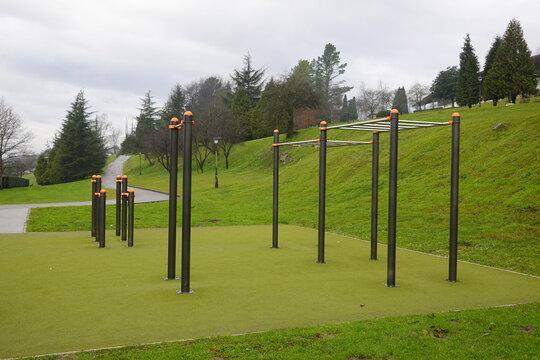 Outdoor calisthenics gym equipment inviting fitness enthusiasts in park setting