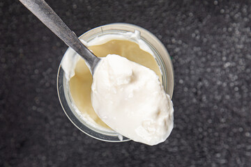 Skyr white yogurt appetizer dish fresh delicious gourmet food background on table rustic food top view copy space keto and paleo diet vegetarian food