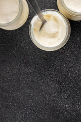Skyr white yogurt appetizer dish fresh delicious gourmet food background on table rustic food top view copy space keto and paleo diet vegetarian food