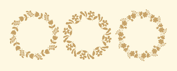Set of simple floral circle frames. Hand drawn botanical wreaths featuring branches, leaves, and flowers. Isolated vector illustrations, perfect for wedding invitations, cards, poster templates.