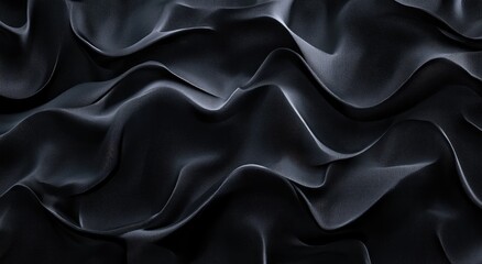 Obraz premium A close-up view of dark, flowing, draped fabric.