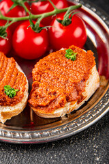 Pepper pate red pepper dip roasted vegetable hummus appetizer vegetables dish fresh gourmet food background on table rustic food top view copy space keto and paleo diet vegetarian and vegan food