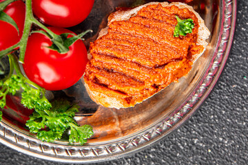 Pepper pate red pepper dip roasted vegetable hummus appetizer vegetables dish fresh gourmet food background on table rustic food top view copy space keto and paleo diet vegetarian and vegan food