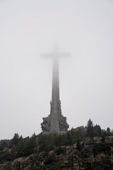 Foggy View of the Valle de los Caídos with Monumental Cross in Spain