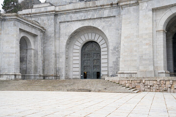 Majestic Valle de los Caídos with Cross in Misty Mountains, Spain