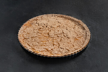 Berry round shortbread tart on dark grey background
