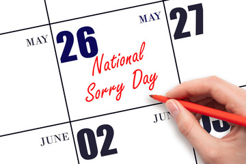 May 26. Hand writing text National Sorry Day on calendar date. Save the date.